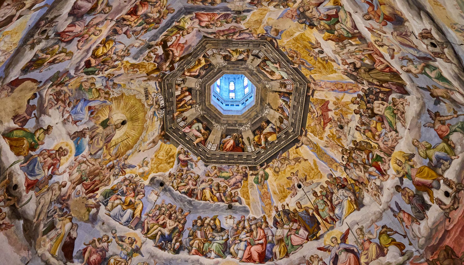 Intricate fresco artwork on the dome of Florence Cathedral showcasing Renaissance artistry.