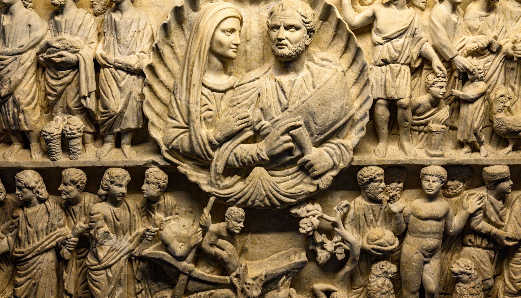 Intricate ancient Roman sarcophagus relief sculpture displayed in Vatican City.