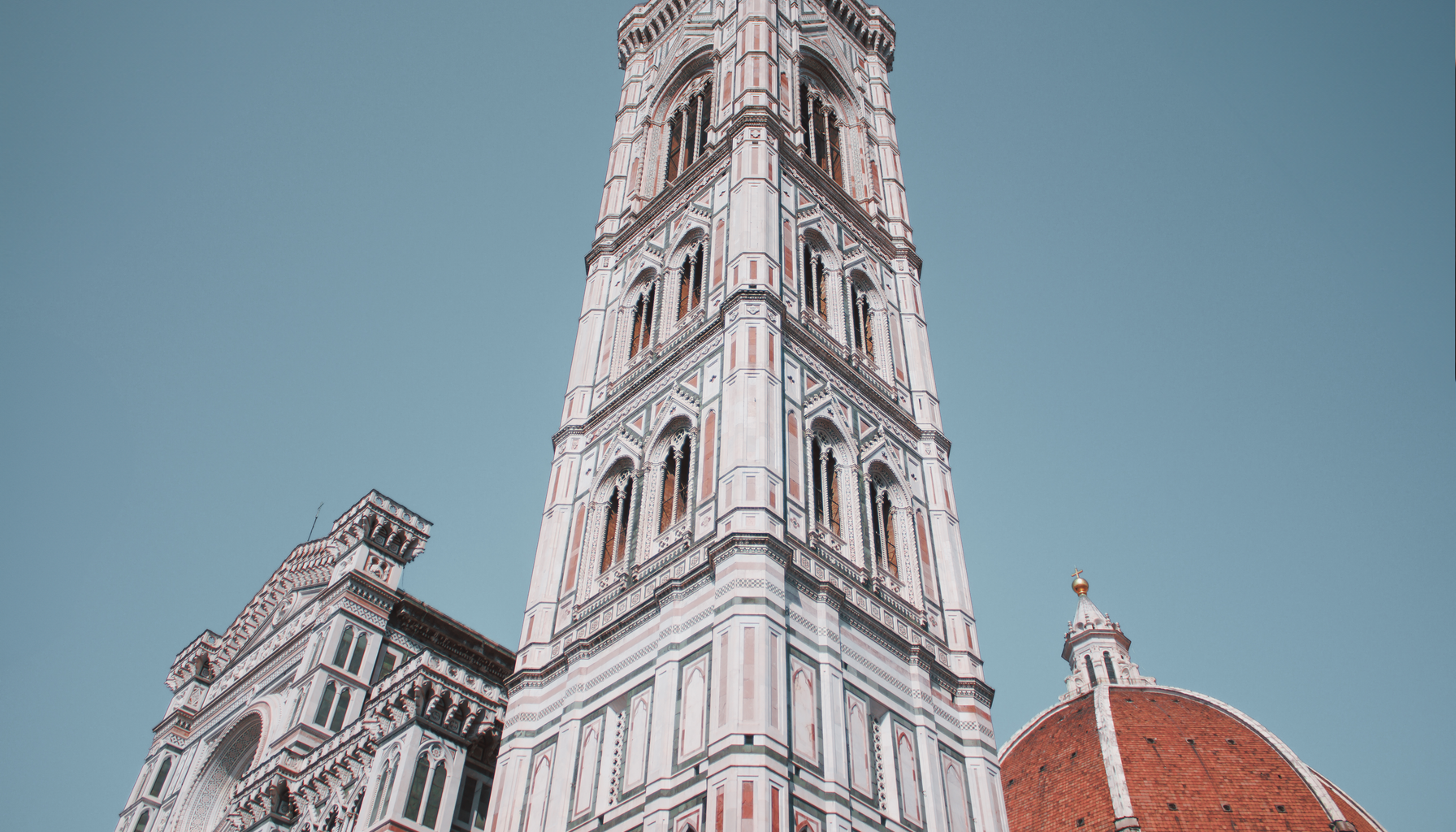 A stunning perspective of Giotto's Campanile, showcasing Gothic architecture in Florence, Italy.