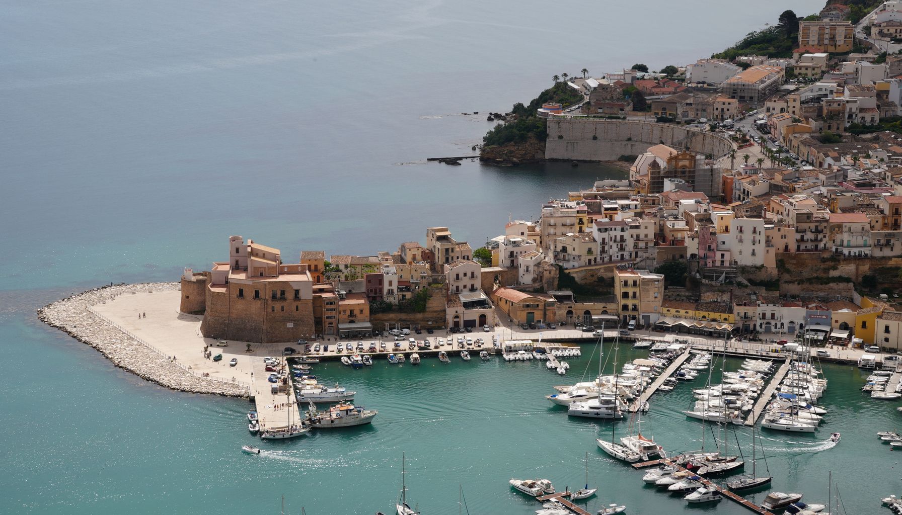 Stunning aerial view of the harbor and historic town of Castellammare del Golfo, Sicily, Italy.